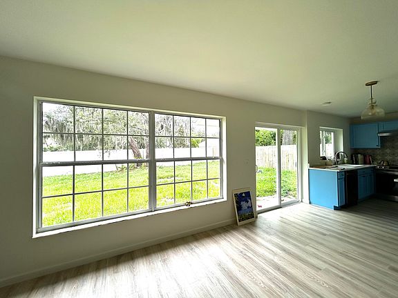 Living Room open concept into dining and kitchen