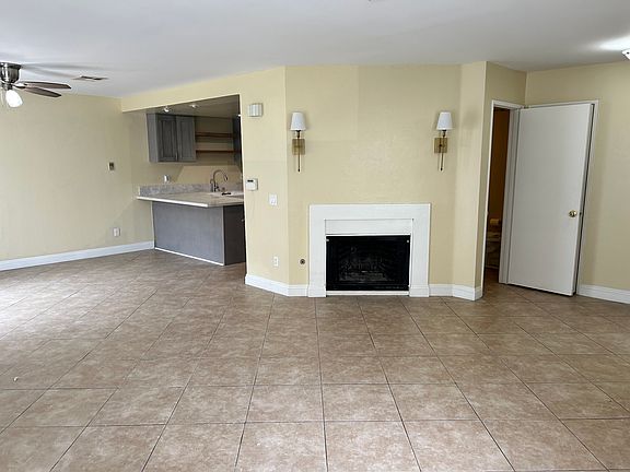 View of open space of kitchen and living area.