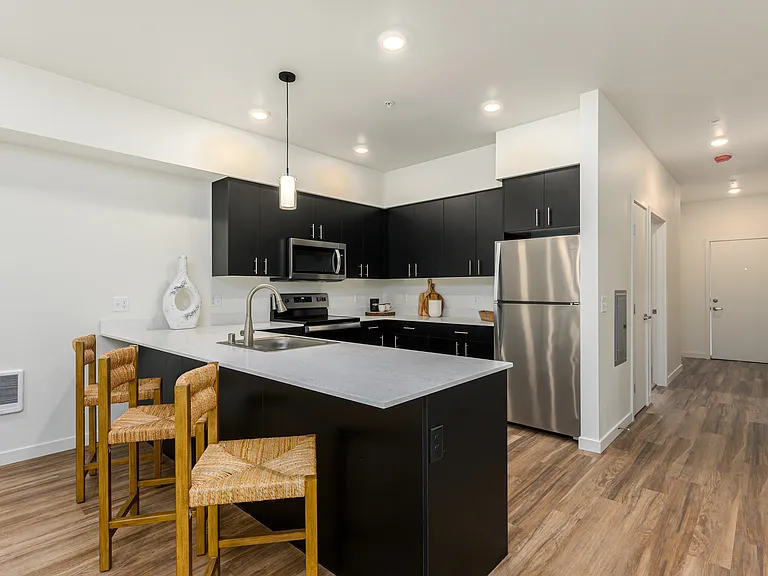Chef's kitchens with stainless appliances and ample storage Chef's kitchens with stainless appliances and ample storage