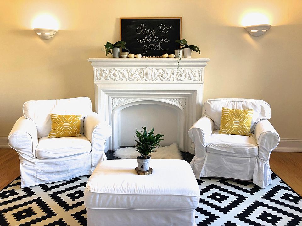 Living room with vintage fireplace.