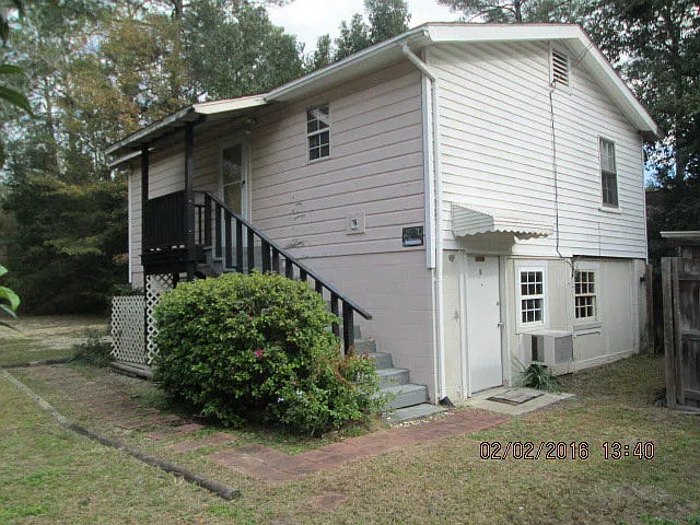 208 1/2 W College St