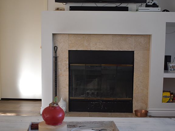 FIreplace in living room to enjoy cool evenings.