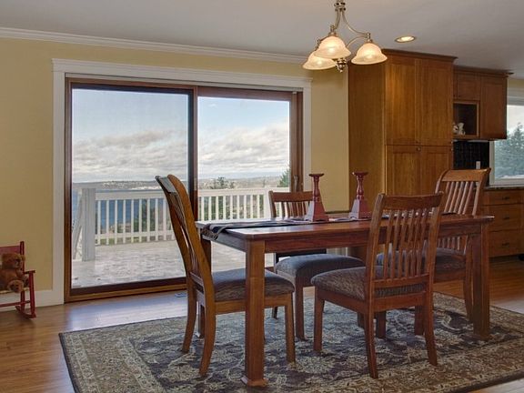 Large dining area has sliders to entertainment sized view deck!
