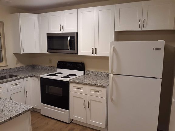New stainless steel microwave, sink and diswasher