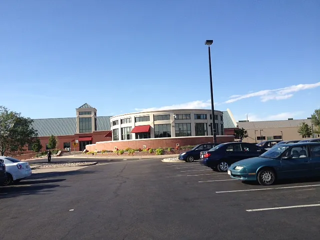 Gorgeous NEW library across the main street (in front of Cotton Creek sign & the Fire Station / Elementary School on 112th).