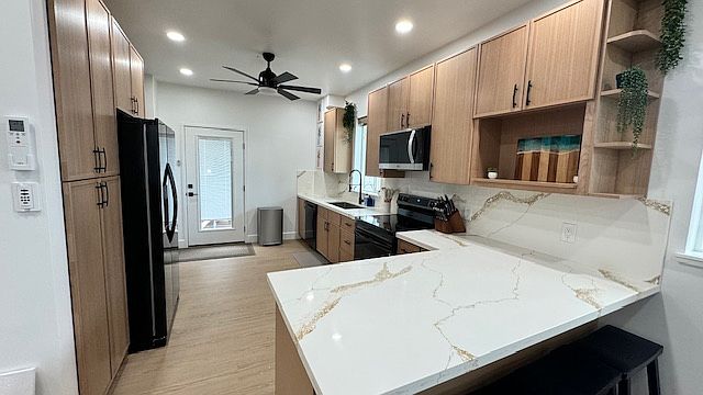 Fully Equipped Kitchen with pots, pans, dishes, utensils etc.