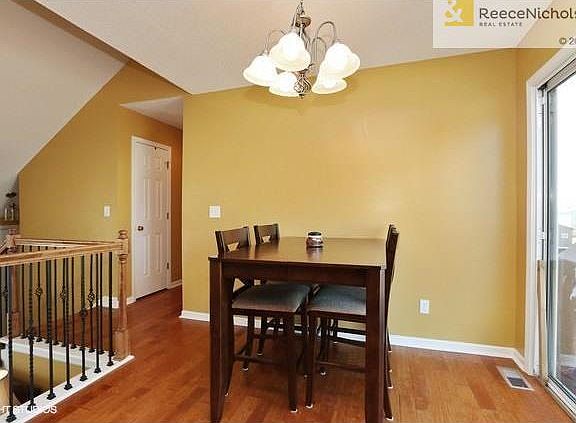 Hardwoods in the family room, dining room , kitchen and hallway.  The dining room is adjacent to kitchen and it has  views of the deck and backyard