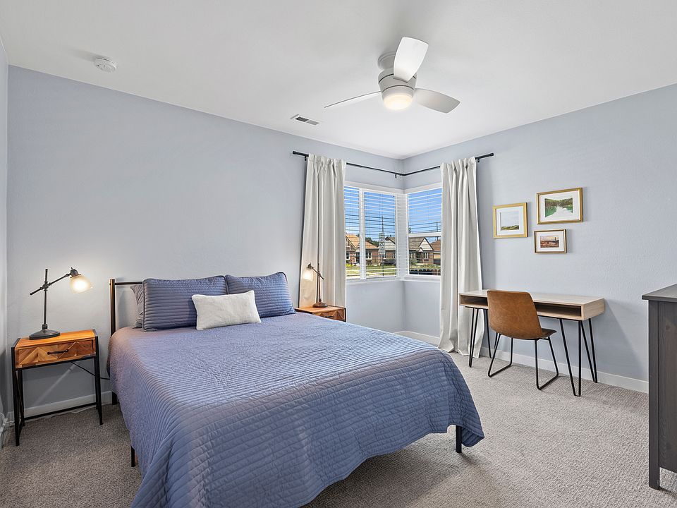 Second light-filled bedroom. Also great for guests or a separate workspace. Blackout curtains on all windows.