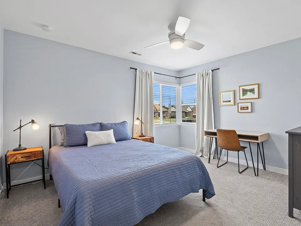 Second light-filled bedroom. Also great for guests or a separate workspace. Blackout curtains on all windows.