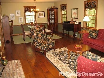 Living Room / Dining Room : Great room with center fireplace