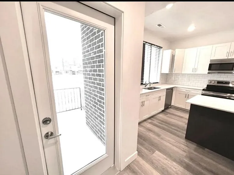 Door to balcony from kitchen