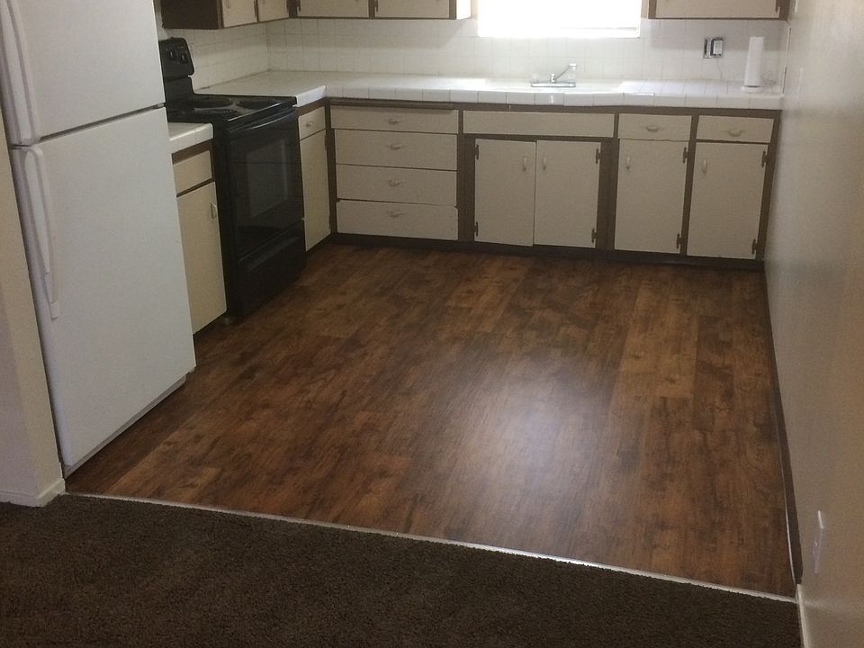 Freshly remodeled kitchen with new flooring and paint.