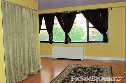 Drapery down at alcove
						:
						Central AC heating unit (in white) below window