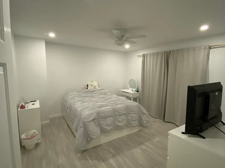 Bedroom with walk-in closet