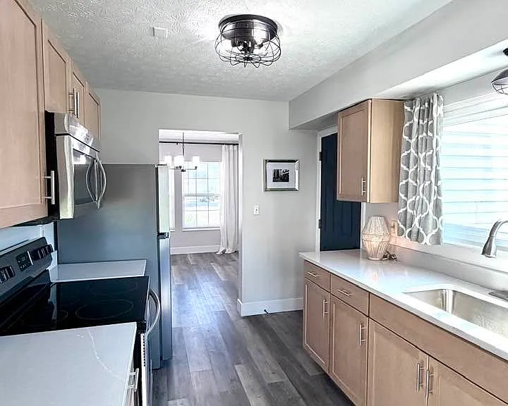 Kitchen leading to formal dining room
