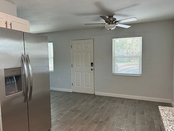 New neutral tiles throughout unit