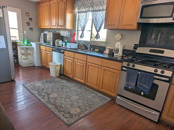 You'll be able to use the sink, counters, and stovetop, and you'll also have several drawers in the kitchen for your own storage.