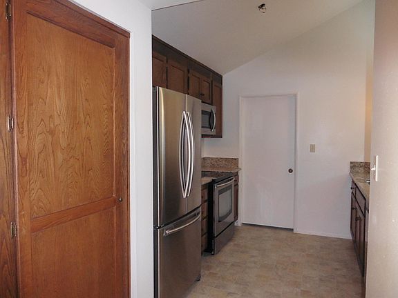 Kitchen stainless appliances and pantry storage