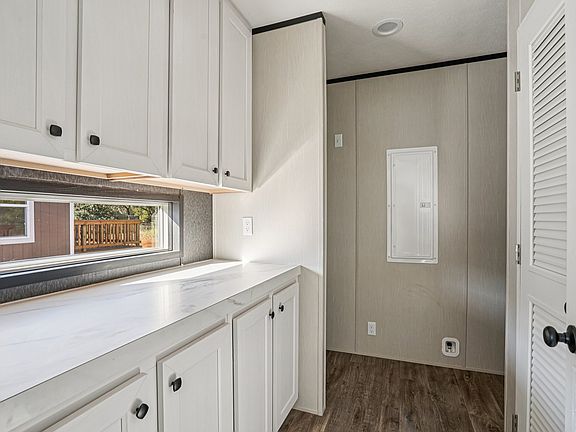 Coffee Bar or Prep Station leading into Laundry
