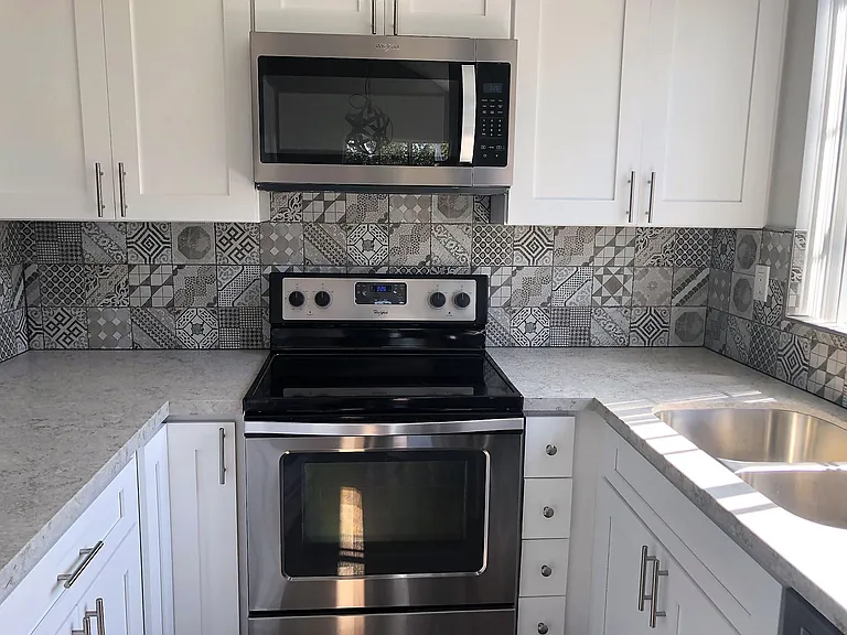 Designer back splash and quartz counters