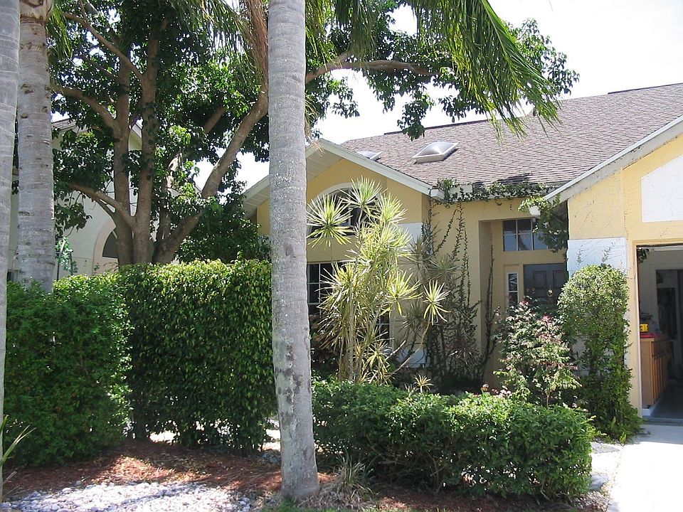 Walk over your bridge in to this unique updated pool home