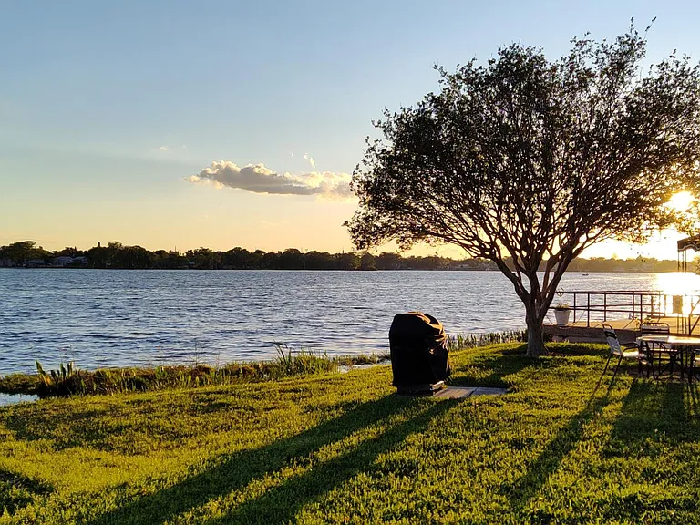 Clubhouse, community grill, lakeside patio, private lake, deck, dock, and boat ramp.