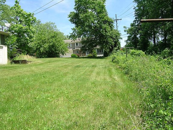 Full Lot + Wooded Area