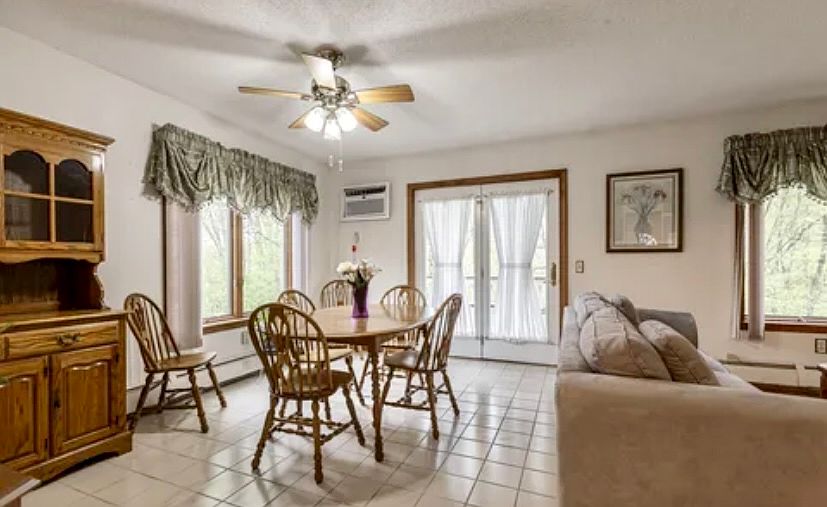 Dining room opens up to a beautiful balcony with beautiful view!