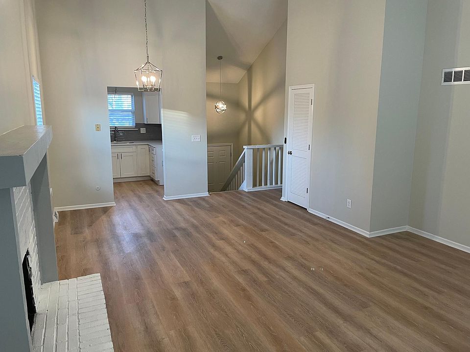 Living room with vaulted ceilings