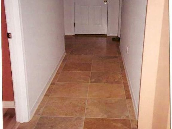 Main entry door/hall Italian tile from Great Room