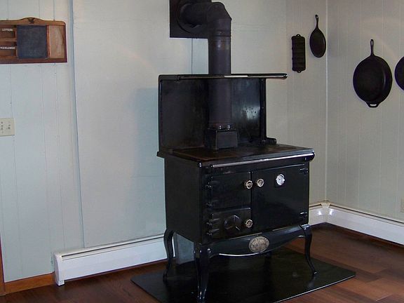 Wood cook stove in kitchen