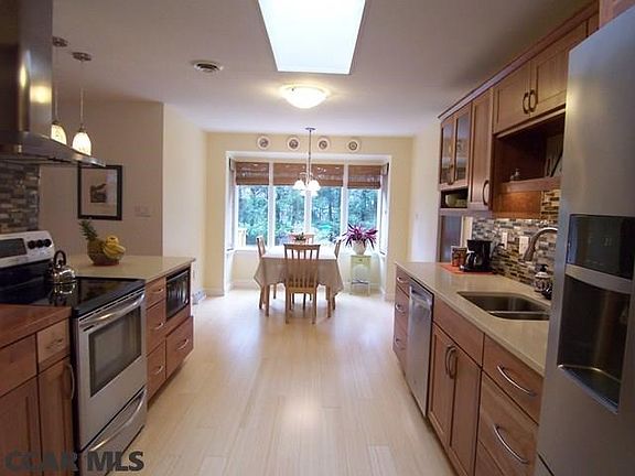 Cherry cabinets and stainless appliances
