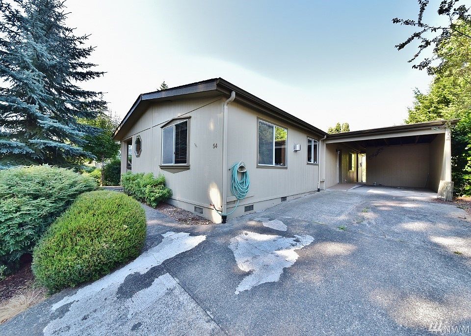Large driveway and covered parking.