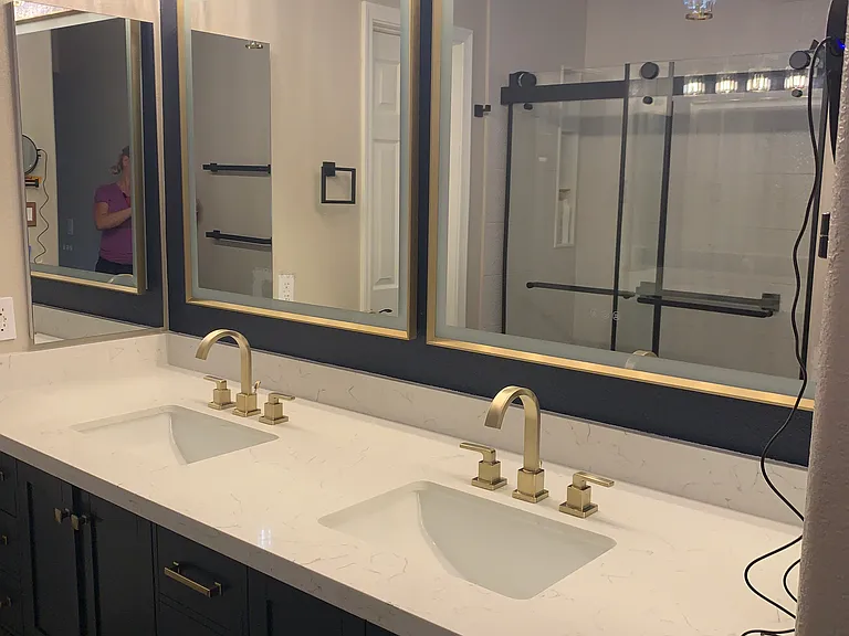 Master suite bath with rain head shower, hand held shower, safety rails, 2 sinks with LED mirrors, 10x magnifying mirror, 2 medicine cabinets, blow dryer, towels for 2