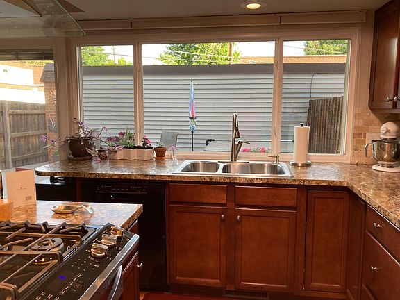 New widows and a brand new slider overlooking a spacious patio, letting lots of natural light in!