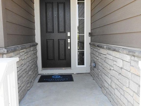 Front Door with Ring Doorbell and Security Lock