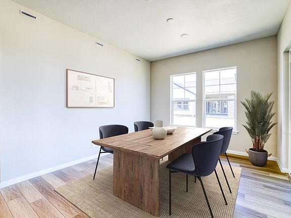 Directly off the kitchen is the quaint cafe which is brightly illuminated with natural light.