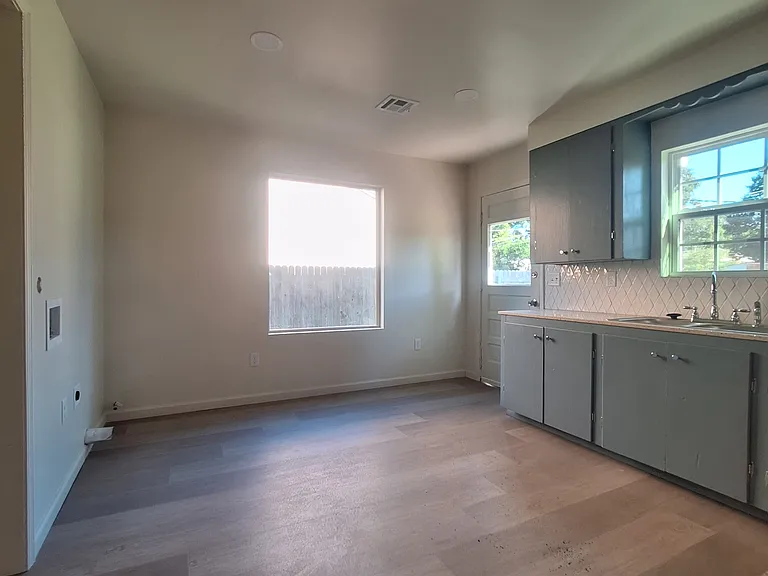 big window in kitchen and back door