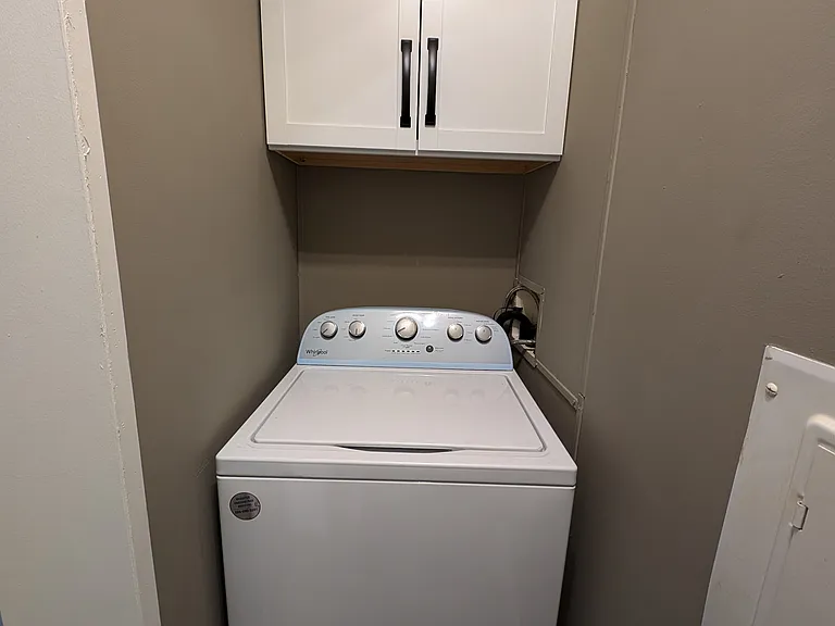 Electric Washer with cabinet above