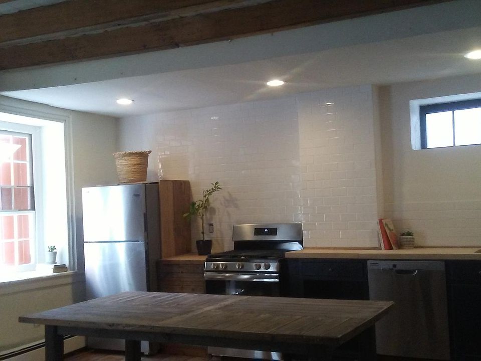 beautiful open concept first floor with semi-furnishings