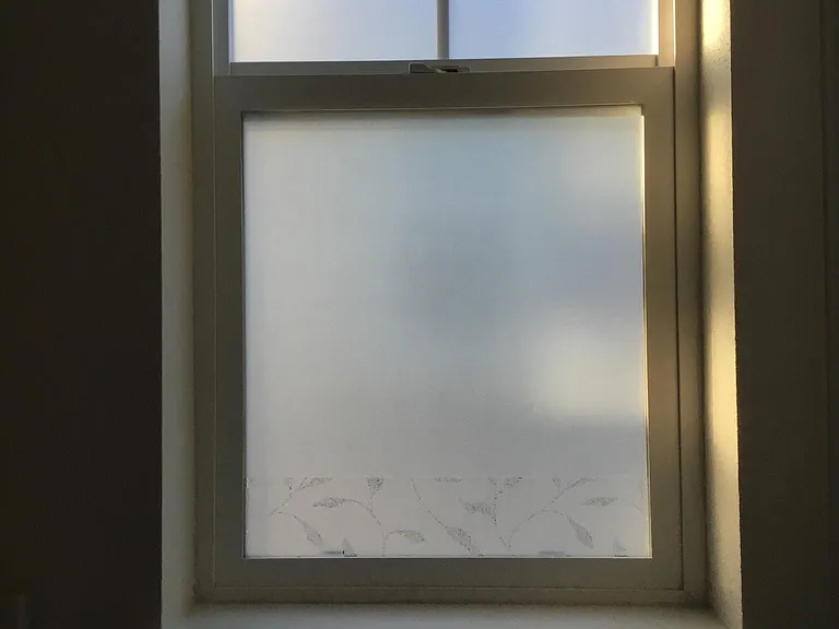 Privacy film on bathroom window
