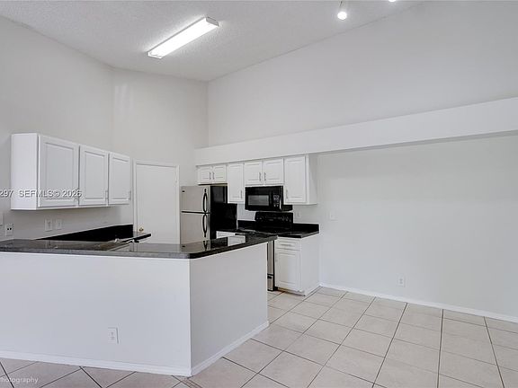4th image of 9999 Summerbreeze Dr APT 409