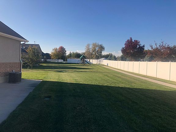 Common green space with playset.