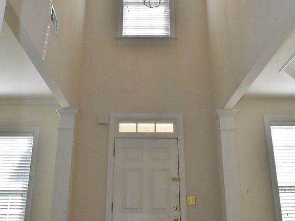 Impressive 2 story foyer.