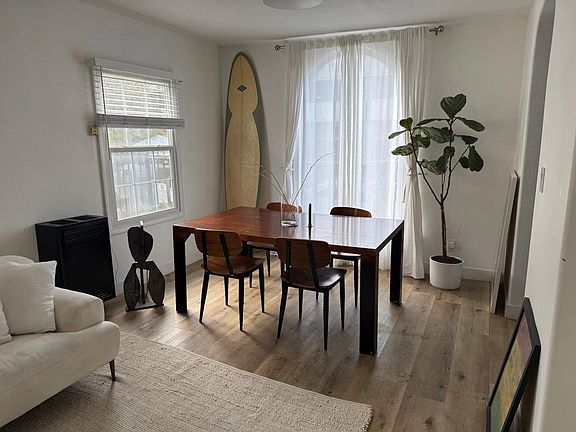 Dining room area which can work as office space for those who work at home.