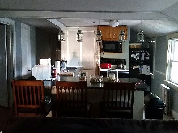 kitchen/living room area -- taken while standing in living room -