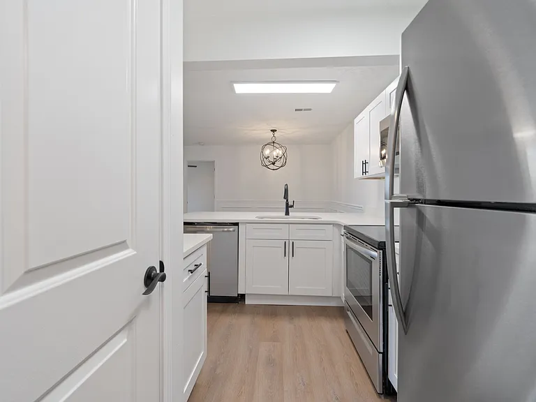 Explore this sleek modern kitchen, perfect for culinary creations and entertaining. Explore this sleek modern kitchen, perfect for culinary creations and entertaining.