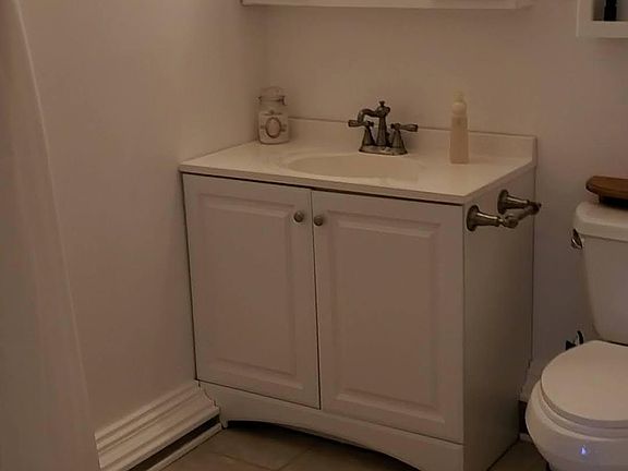 New vanity, cabinets, and shower! New tile throughout bathroom!