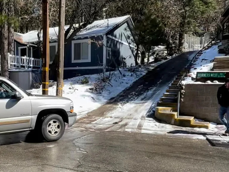 This is the driveway that you must be able to drive up in order to get into the garage and additional parking space.