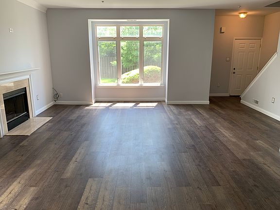 Great room with large bay windows with lots of sunlight